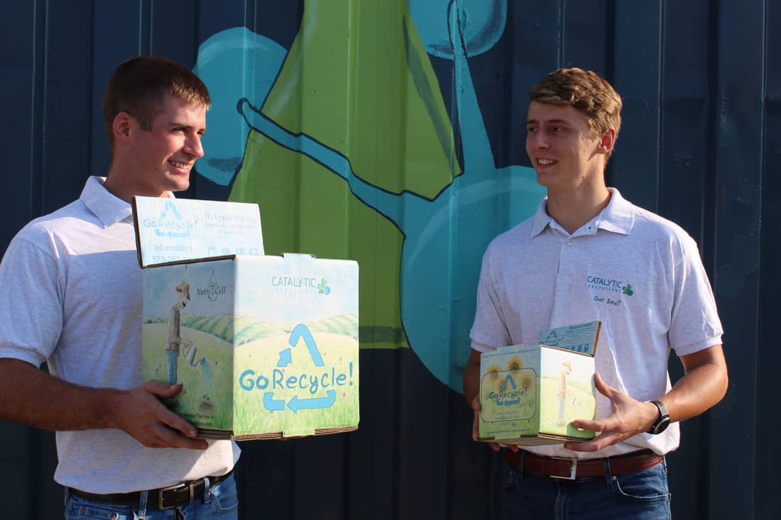 Two Men Holding GoRecycle Boxes
